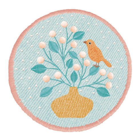 このケースには鳥と花の刺繍が施されています。