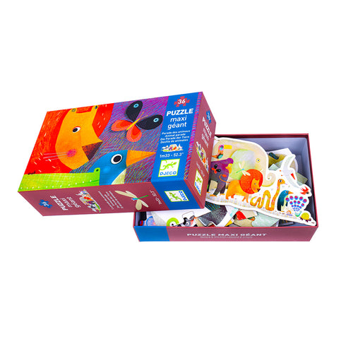 完成すると横幅約133㎝にもなる大きなジグソーパズル。動物たちがパレードしている様子が描かれています。見本付き。