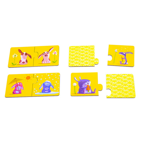 表には何かをしている動物たちのイラストが、裏にはDJECOのロゴマークが描かれています。