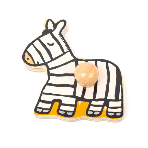 シマウマのイラストが描かれた木製のピースです。