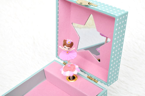 フタを開けるとかわいいバレリーナの人形が入っています。ゼンマイを回すとオルゴールに合わせて人形がくるくると回りだします。